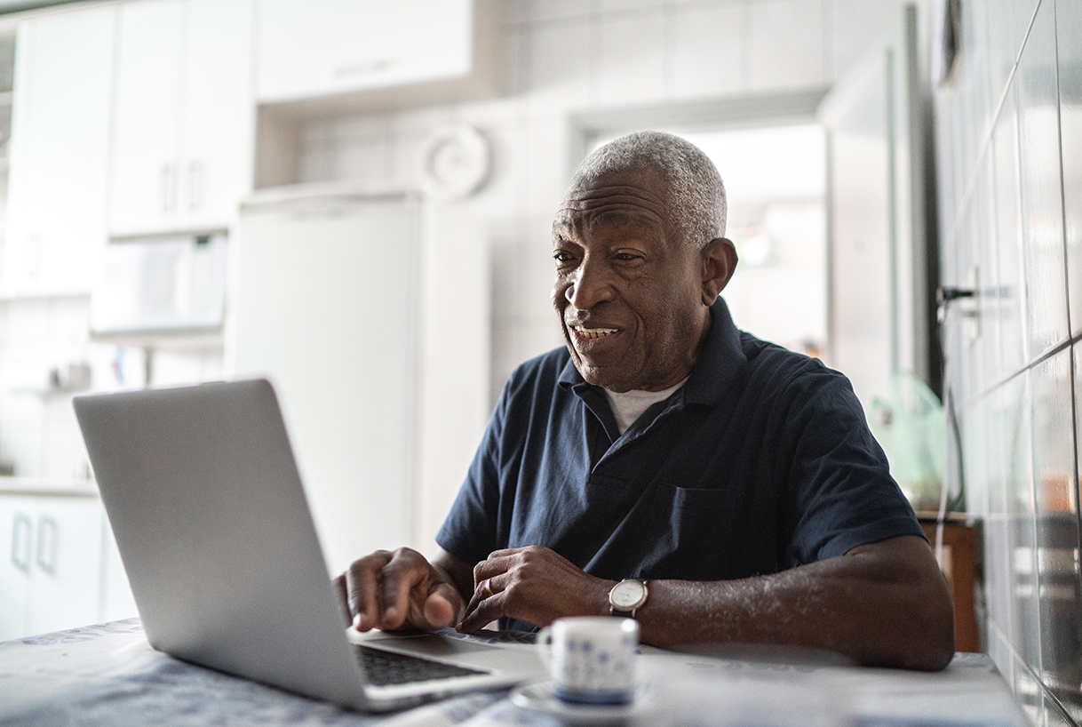 Older man using technology for seniors